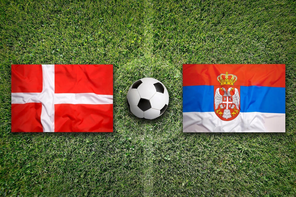 Denmark,Vs.,Serbia,Flags,On,Green,Soccer,Field