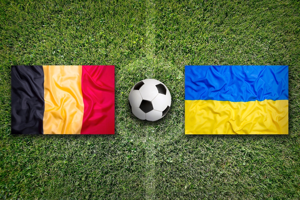 Belgium,Vs.,Ukraine,Flags,On,Green,Soccer,Field